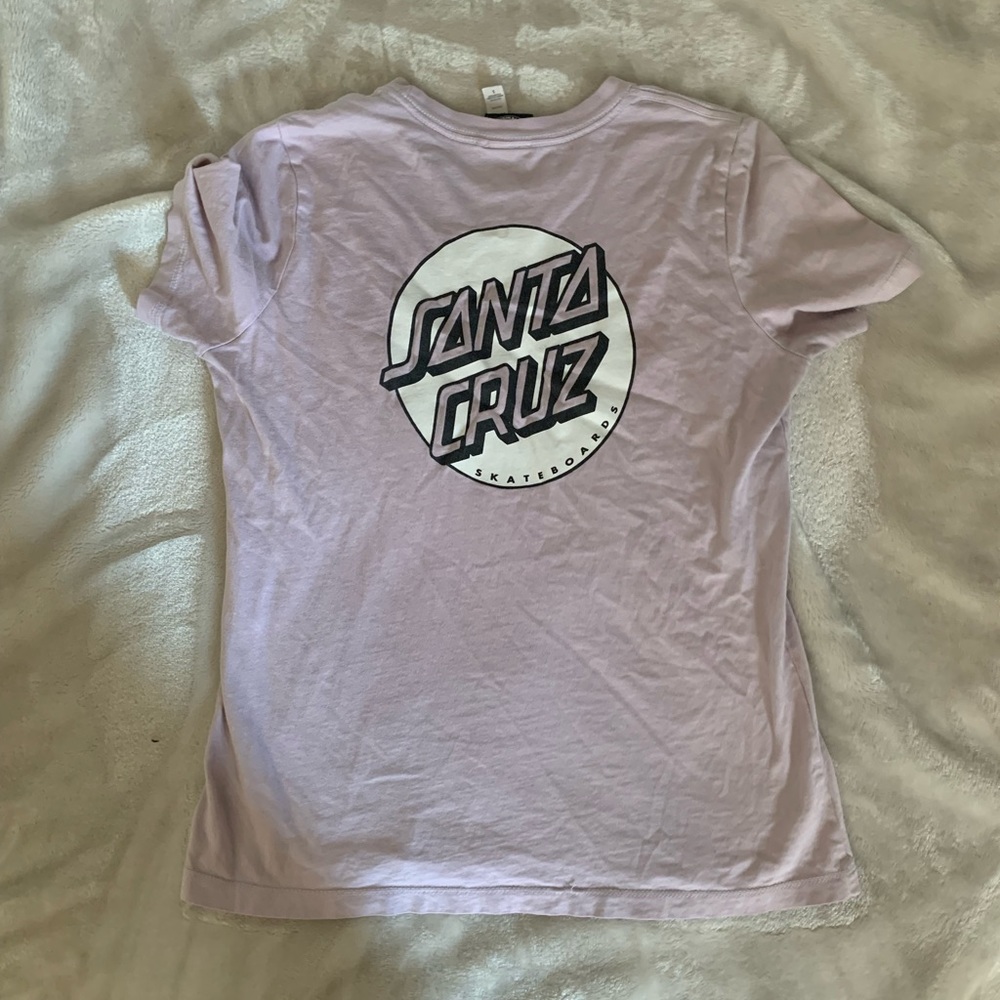 Pink Santa Cruz shirt.